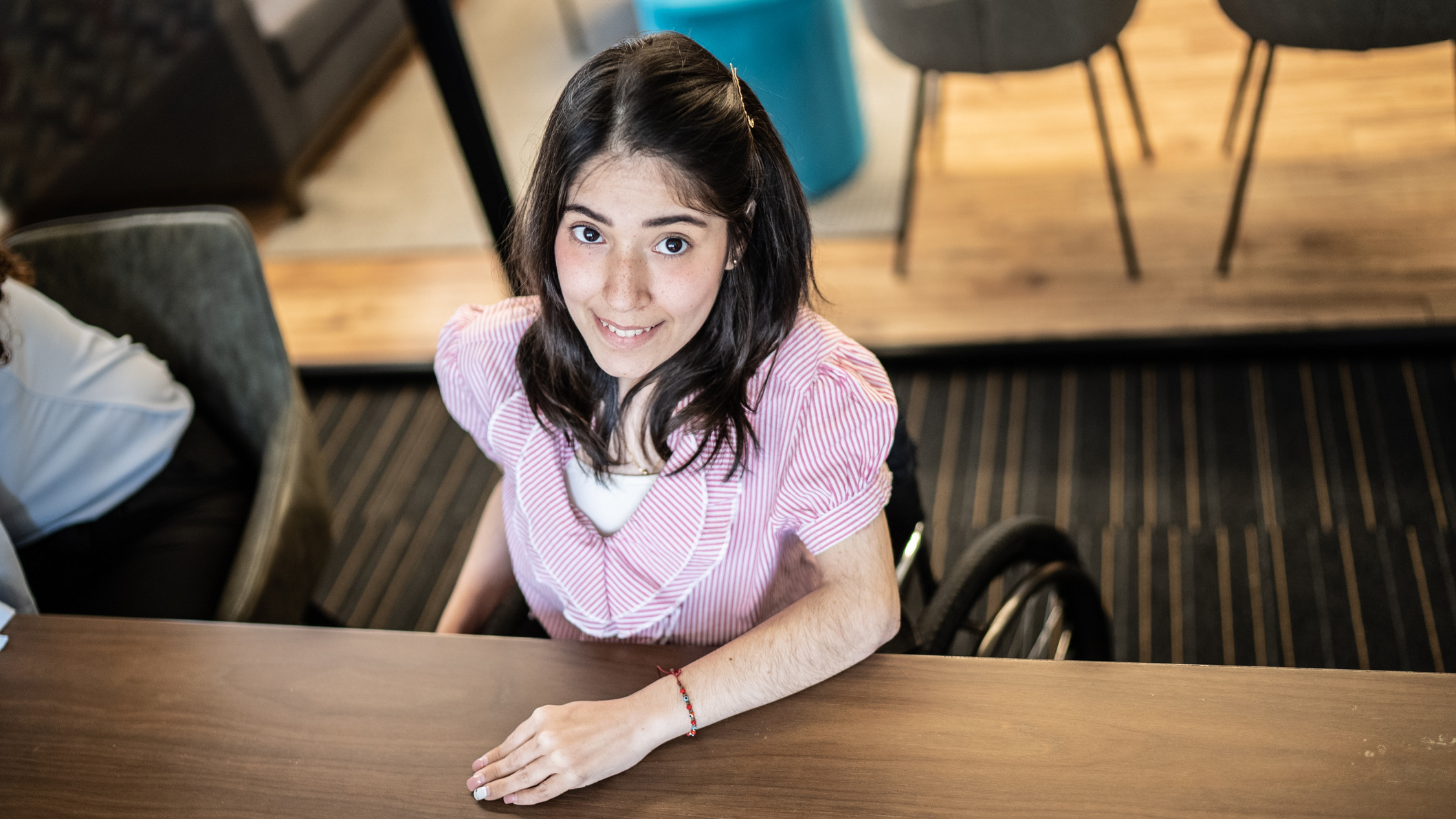 Portrait of disabled young woman at the office
