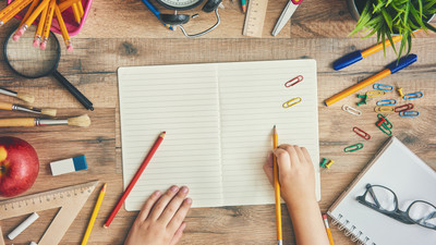 Wooden desk with supplies