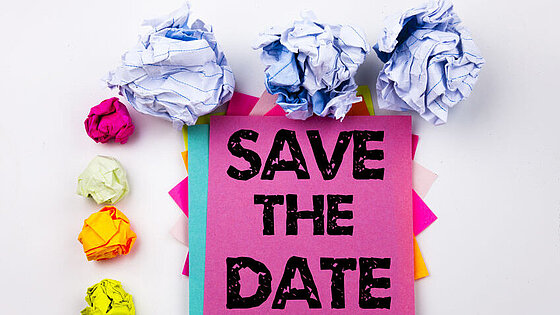 Writing text showing Save The Date written on sticky note in office with screw paper balls. Business concept for Special Day and Greeting on the white isolated background.