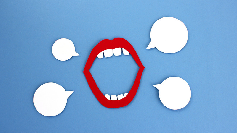 Paper mouth with blank speech bubbles